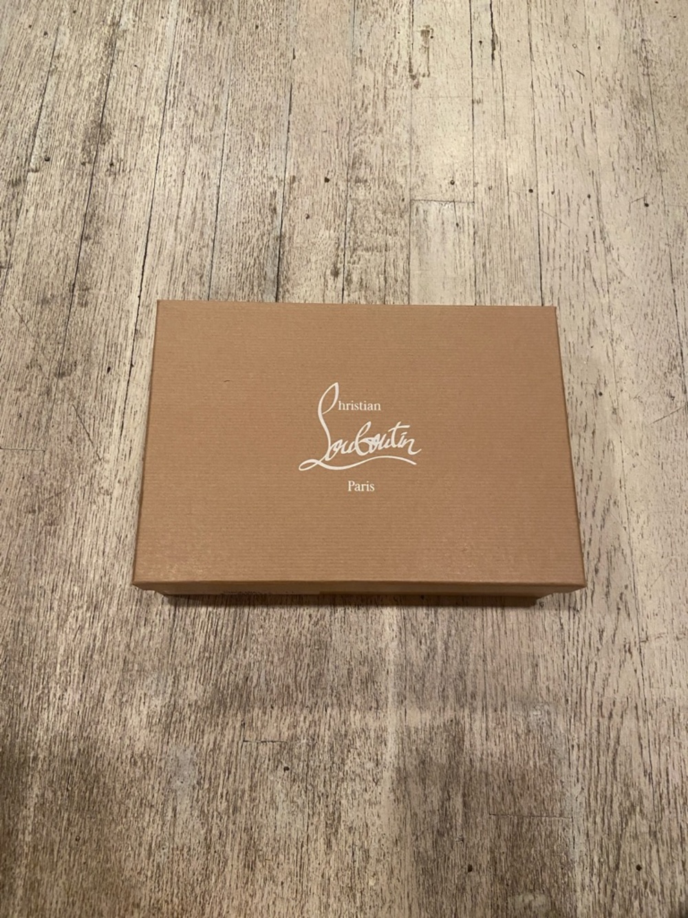 Christian Louboutin Tan Logo empty Box
red lining inside of Box 11/8